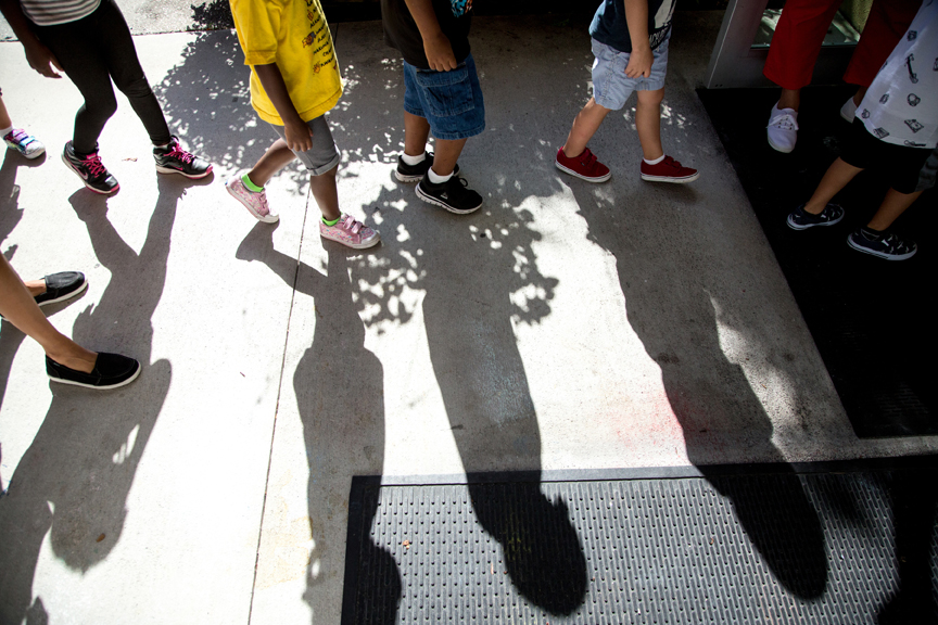 Children walking in a line.