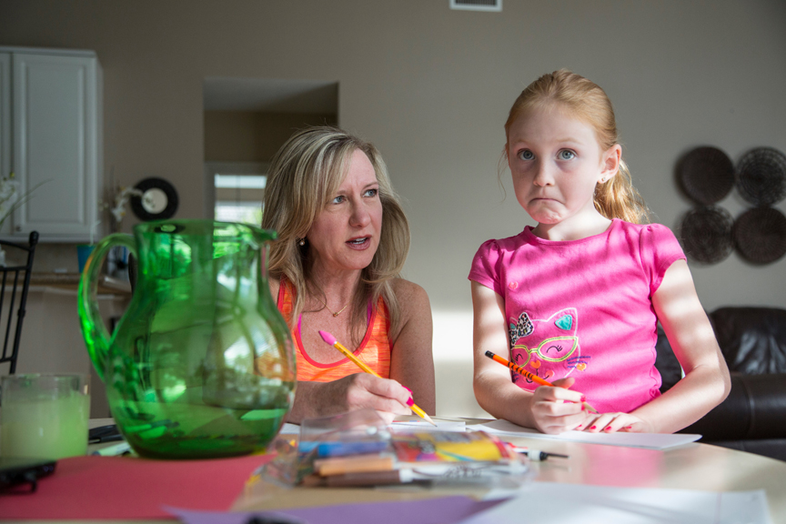 Mother and daughter working on homework